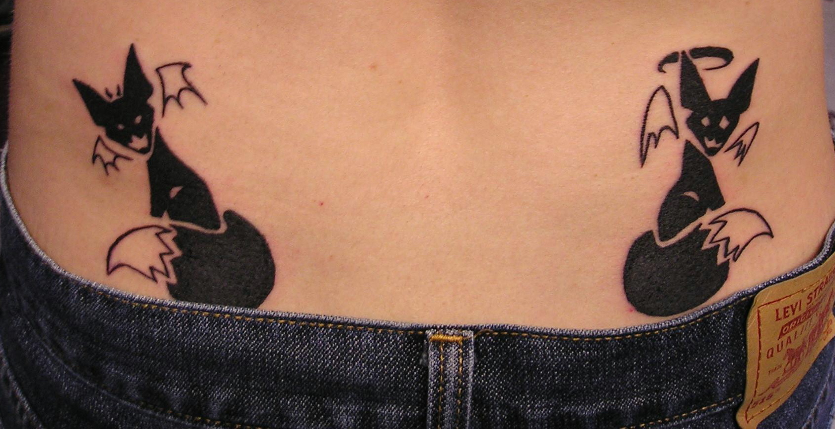 Lower back tattoos